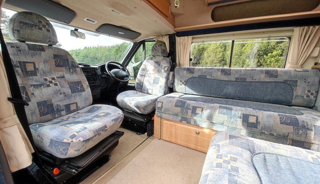 Caravan interior seats photographed for an online sales advert