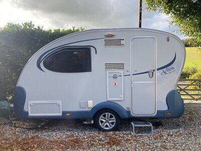 Adria Action 361LH 2 Berth Caravan Lightweight inc Outdoor Revolution Air Awning Adria Action 361LH 2 Berth Caravan Lightweight inc Outdoor Revolution Air Awning