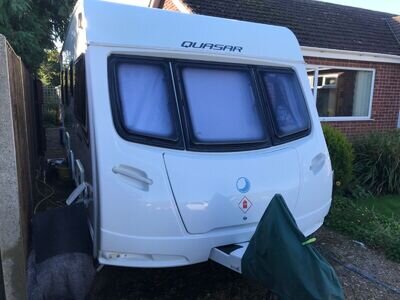 2013 Lunar Quasar 554 4 berth fixed bed touring caravan with Motor Mover 2013 Lunar Quasar 554 4 berth fixed bed touring caravan with Motor Mover