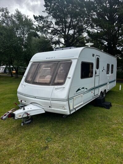 Swift Conqueror 645 Lux 4 Berth Twin Axle , fixed island bed Touring Caravan Swift Conqueror 645 Lux 4 Berth Twin Axle , fixed island bed Touring Caravan