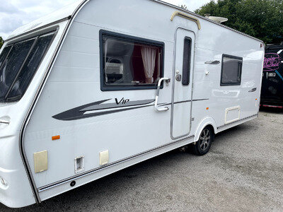 Coachman VIP 560/4 Caravan with Motor Mover Coachman VIP 560/4 Caravan with Motor Mover