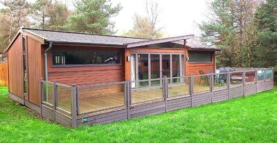 Pre-owned 2 bedroom Pinelog lodge for relocation 40' X 22' Sleeps 4 Twin unit