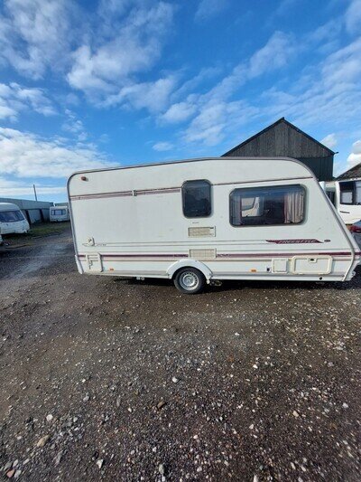 Abbey 2 berth caravan with awning and motor mover