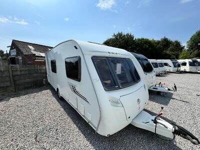 SWIFT CHARISMA 560 2010 MODEL 4 BERTH REAR WASHROOM TOURING CARAVAN SWIFT CHARISMA 560 2010 MODEL 4 BERTH REAR WASHROOM TOURING CARAVAN