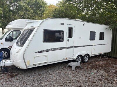 SWIFT CONQUEROR 645 - 4 BERTH TWIN AXLE CARAVAN,FIXED ISLAND BED+ MOTORMOVER