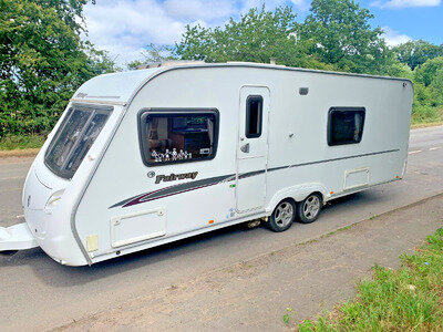 TWIN WHEEL FIXED BED CARAVAN SWIFT FAIRWAY 620 WITH MOTOR MOVER 2008 TWIN WHEEL FIXED BED CARAVAN SWIFT FAIRWAY 620 WITH MOTOR MOVER 2008