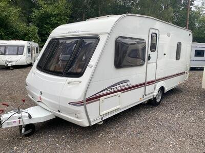 SWIFT CHARISMA 550/4 - FIXED BED - 4 BERTH - MOVER & AWNING SWIFT CHARISMA 550/4 - FIXED BED - 4 BERTH - MOVER & AWNING