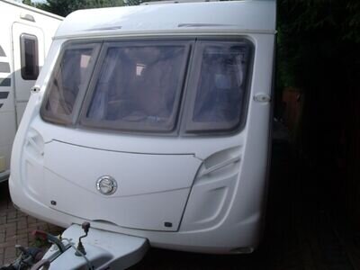 2007 Swift Charisma 590 Caravan. Fixed bunk beds. 6 berth. Twin axle. microwave. 2007 Swift Charisma 590 Caravan. Fixed bunk beds. 6 berth. Twin axle. microwave.