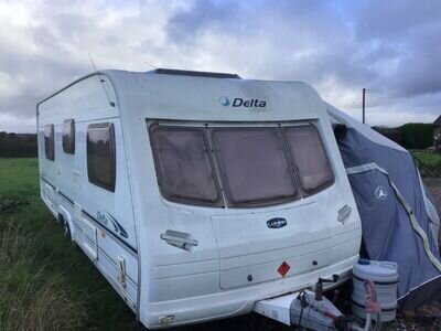 Lunar Delta 640 EW Twin Axle Fixed Bed Caravan 2004 including Blow Up Awning Lunar Delta 640 EW Twin Axle Fixed Bed Caravan 2004 including Blow Up Awning