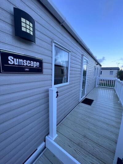 STUNNING ABI SUNSCAPE WITH DECKING STUNNING ABI SUNSCAPE WITH DECKING